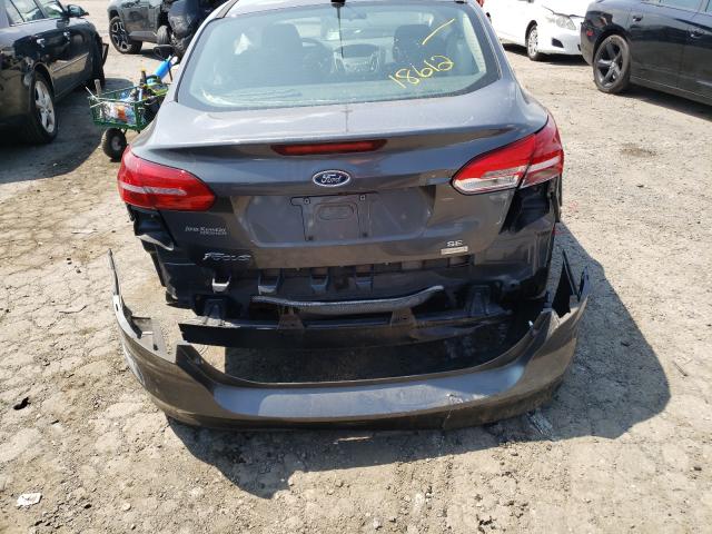 Photo 8 VIN: 1FADP3FE9JL318612 - FORD FOCUS SE 