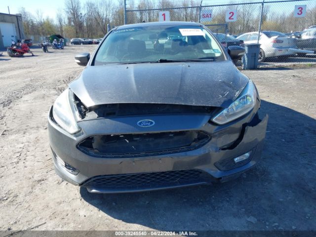 Photo 5 VIN: 1FADP3FEXFL310817 - FORD FOCUS 