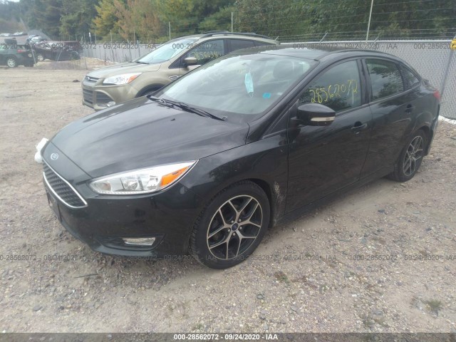 Photo 1 VIN: 1FADP3FEXFL339606 - FORD FOCUS 