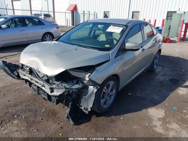 Photo 1 VIN: 1FADP3FEXGL234047 - FORD FOCUS SE 