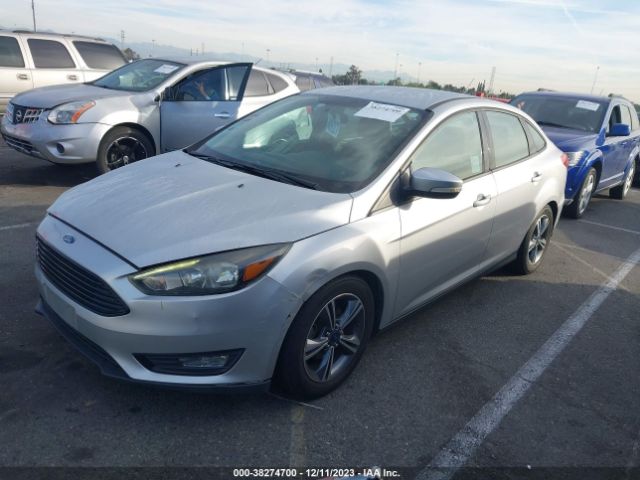 Photo 1 VIN: 1FADP3FEXGL310477 - FORD FOCUS 