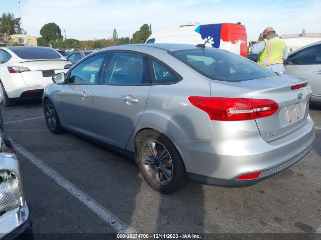 Photo 2 VIN: 1FADP3FEXGL310477 - FORD FOCUS 