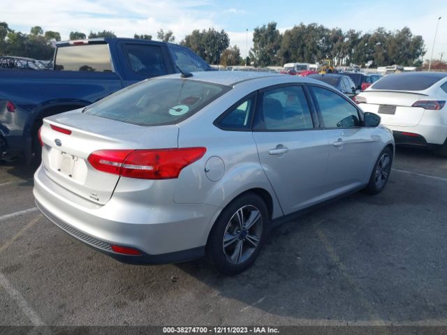 Photo 3 VIN: 1FADP3FEXGL310477 - FORD FOCUS 