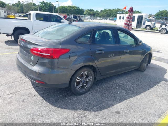 Photo 3 VIN: 1FADP3FEXGL343382 - FORD FOCUS 