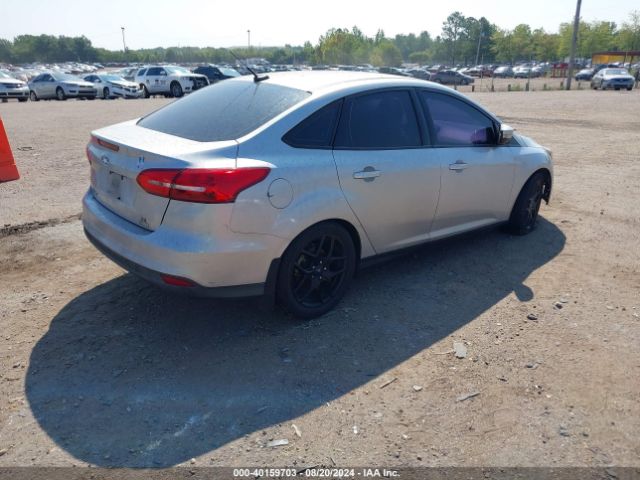 Photo 3 VIN: 1FADP3FEXGL356214 - FORD FOCUS 