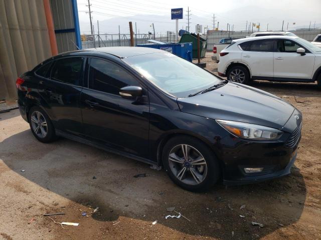 Photo 3 VIN: 1FADP3FEXGL406934 - FORD FOCUS SE 