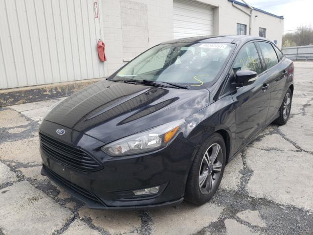 Photo 1 VIN: 1FADP3FEXHL292418 - FORD FOCUS SE 