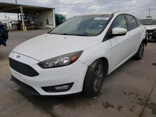 Photo 1 VIN: 1FADP3FEXHL317284 - FORD FOCUS SE 