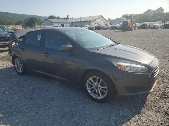 Photo 3 VIN: 1FADP3FEXJL226117 - FORD FOCUS SE 