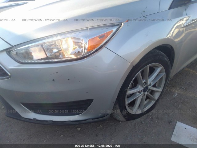 Photo 5 VIN: 1FADP3FEXJL311149 - FORD FOCUS 