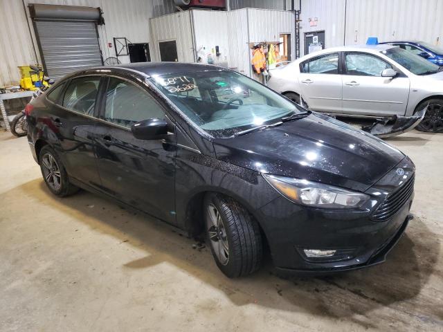 Photo 3 VIN: 1FADP3FEXJL329196 - FORD FOCUS SE 