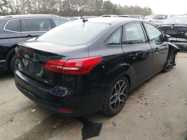 Photo 3 VIN: 1FADP3H20HL294052 - FORD FOCUS SEL 