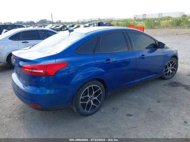 Photo 3 VIN: 1FADP3H20JL258884 - FORD FOCUS 