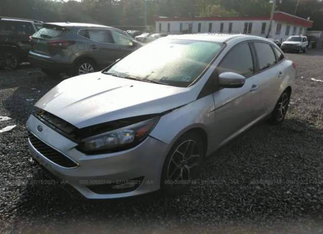 Photo 1 VIN: 1FADP3H20JL298382 - FORD FOCUS 