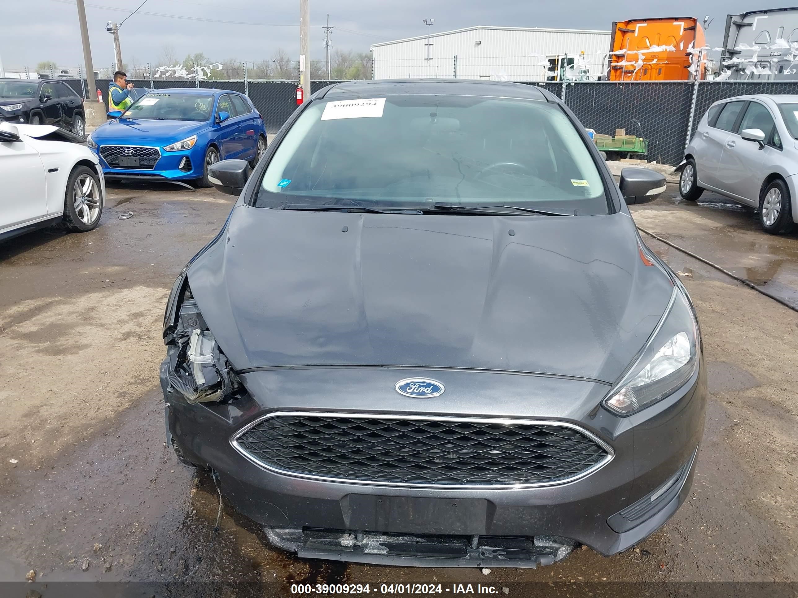 Photo 11 VIN: 1FADP3H20JL312099 - FORD FOCUS 