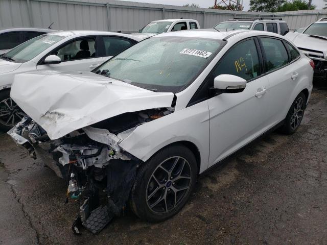 Photo 1 VIN: 1FADP3H21JL209774 - FORD FOCUS SEL 