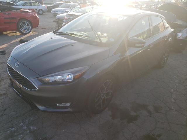 Photo 1 VIN: 1FADP3H21JL243861 - FORD FOCUS SEL 