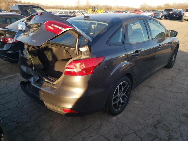 Photo 3 VIN: 1FADP3H21JL243861 - FORD FOCUS SEL 