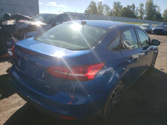 Photo 3 VIN: 1FADP3H21JL243875 - FORD FOCUS SEL 