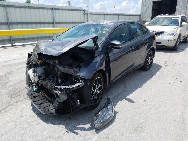 Photo 1 VIN: 1FADP3H21JL255976 - FORD FOCUS SEL 