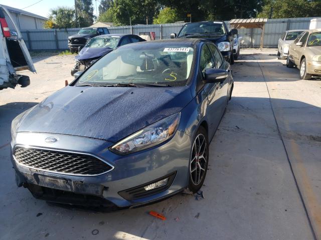 Photo 1 VIN: 1FADP3H21JL266086 - FORD FOCUS SEL 