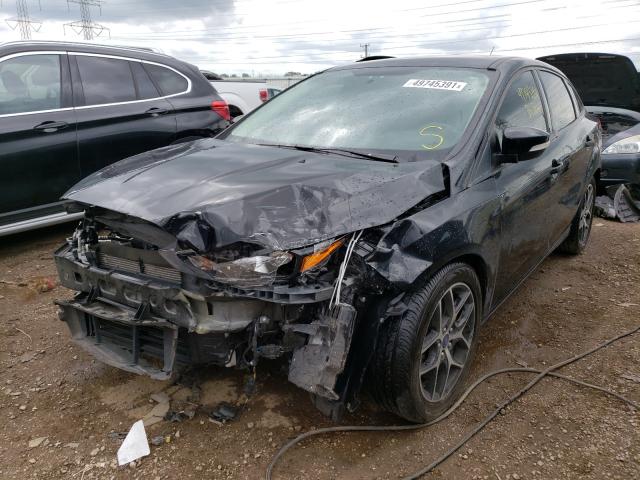 Photo 1 VIN: 1FADP3H21JL300494 - FORD FOCUS SEL 