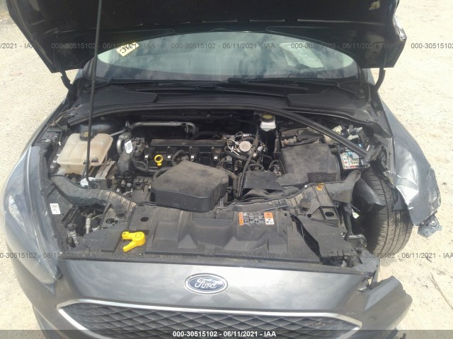 Photo 9 VIN: 1FADP3H22HL325026 - FORD FOCUS 