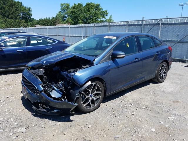 Photo 1 VIN: 1FADP3H22JL202428 - FORD FOCUS SEL 