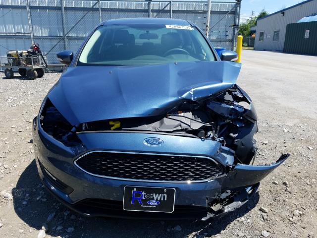 Photo 8 VIN: 1FADP3H22JL202428 - FORD FOCUS SEL 