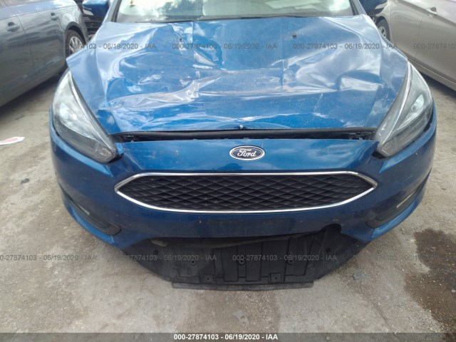 Photo 5 VIN: 1FADP3H22JL259096 - FORD FOCUS 