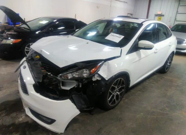 Photo 1 VIN: 1FADP3H22JL259695 - FORD FOCUS 