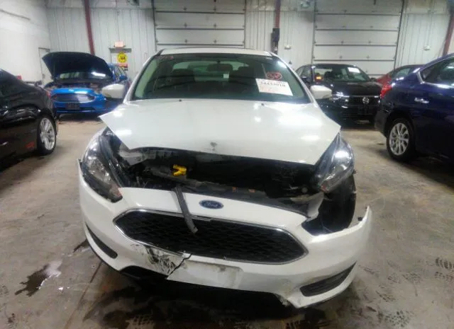 Photo 5 VIN: 1FADP3H22JL259695 - FORD FOCUS 