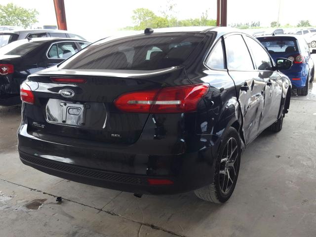 Photo 3 VIN: 1FADP3H22JL265836 - FORD FOCUS 