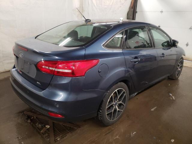 Photo 3 VIN: 1FADP3H22JL294544 - FORD FOCUS 