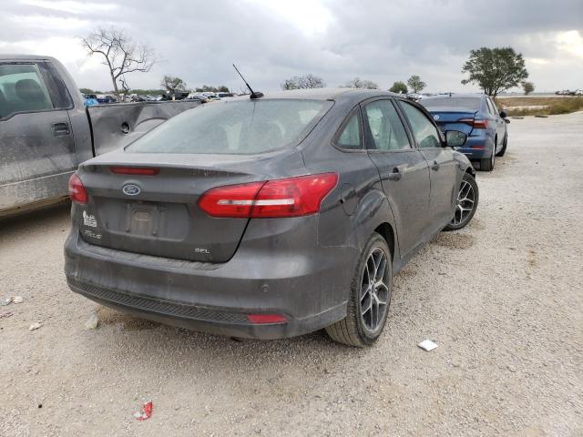 Photo 3 VIN: 1FADP3H23HL307764 - FORD FOCUS 