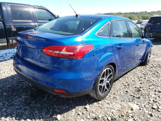 Photo 3 VIN: 1FADP3H23JL204558 - FORD FOCUS 