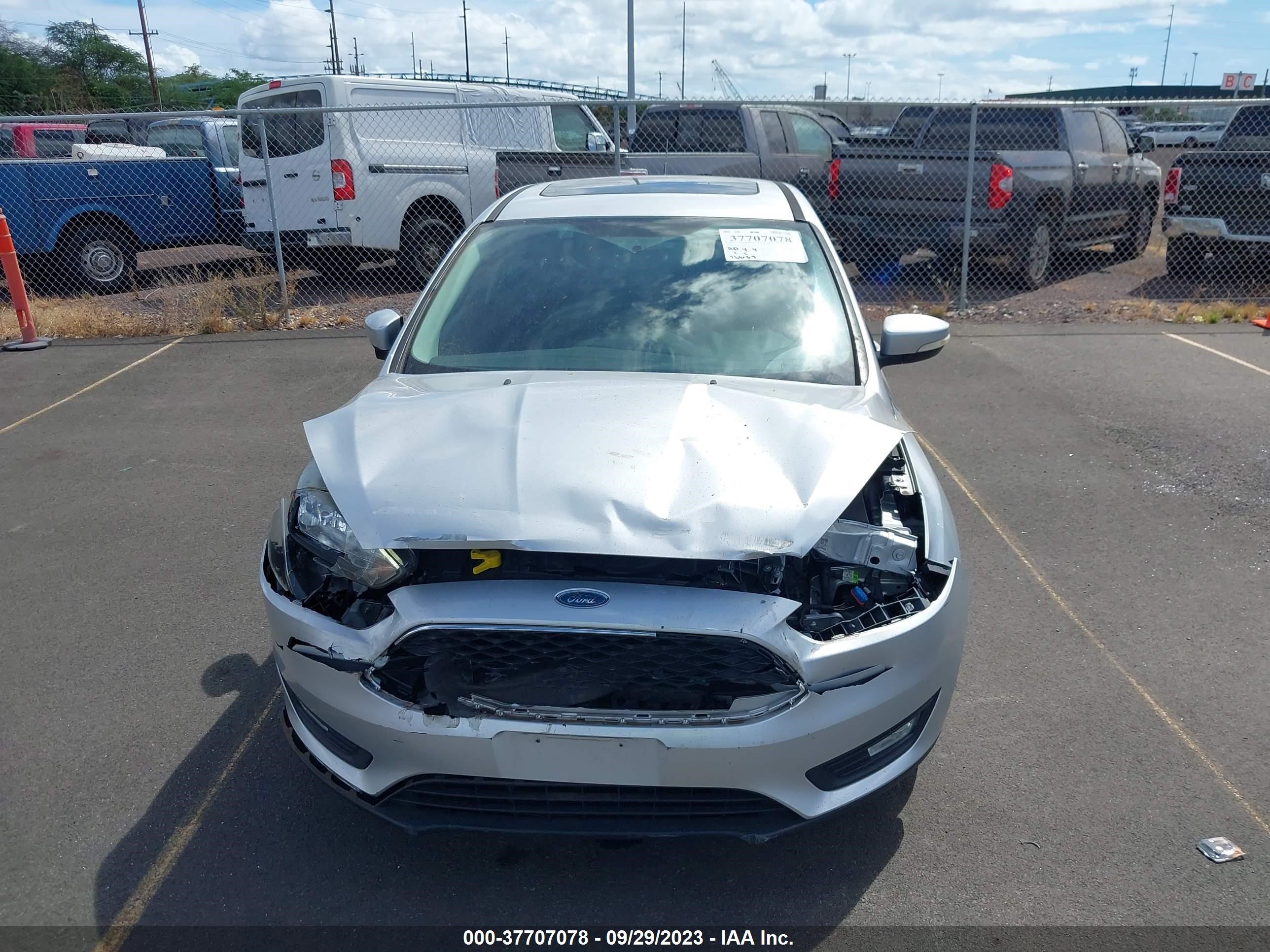 Photo 12 VIN: 1FADP3H23JL313506 - FORD FOCUS 