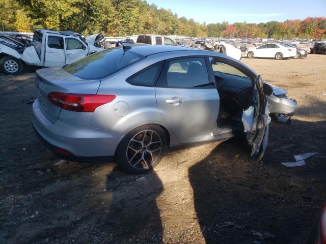 Photo 3 VIN: 1FADP3H23JL323534 - FORD FOCUS 