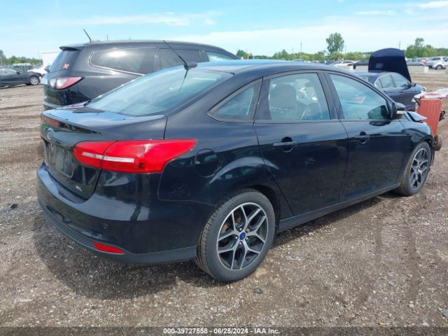 Photo 3 VIN: 1FADP3H24HL229298 - FORD FOCUS 