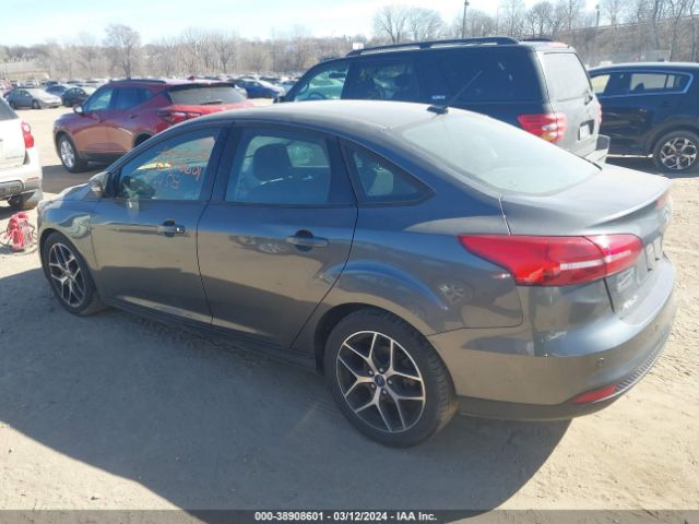 Photo 2 VIN: 1FADP3H24JL322389 - FORD FOCUS 