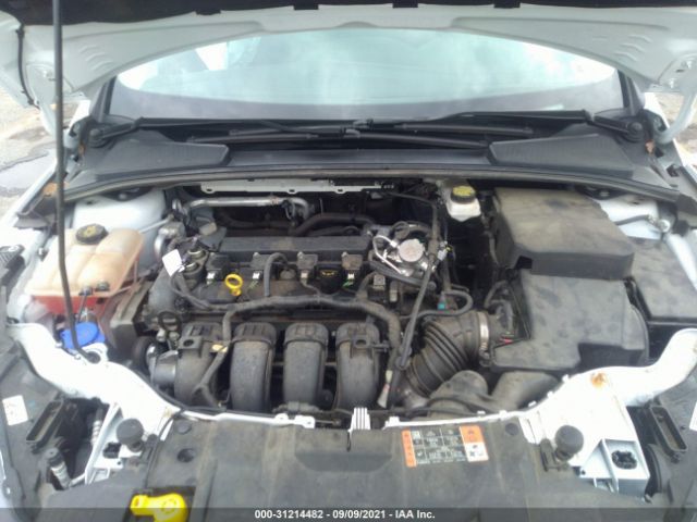 Photo 9 VIN: 1FADP3H25HL317650 - FORD FOCUS 