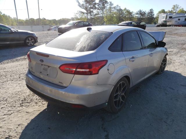 Photo 3 VIN: 1FADP3H25JL214475 - FORD FOCUS 