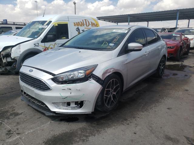 Photo 1 VIN: 1FADP3H25JL217313 - FORD FOCUS SEL 