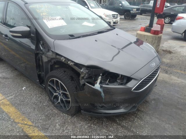 Photo 5 VIN: 1FADP3H25JL227405 - FORD FOCUS 