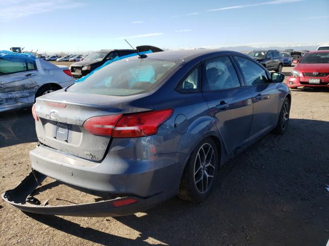 Photo 3 VIN: 1FADP3H25JL260176 - FORD FOCUS SEL 