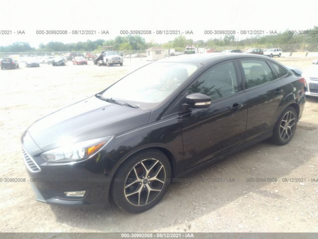 Photo 1 VIN: 1FADP3H26JL202545 - FORD FOCUS 