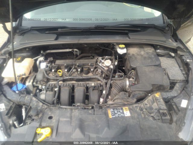 Photo 9 VIN: 1FADP3H26JL202545 - FORD FOCUS 