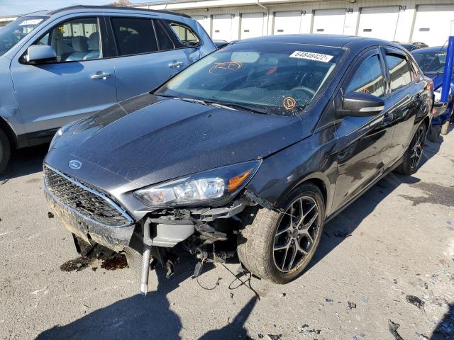 Photo 1 VIN: 1FADP3H26JL320806 - FORD FOCUS SEL 