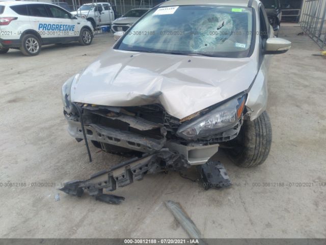 Photo 5 VIN: 1FADP3H27HL205089 - FORD FOCUS 