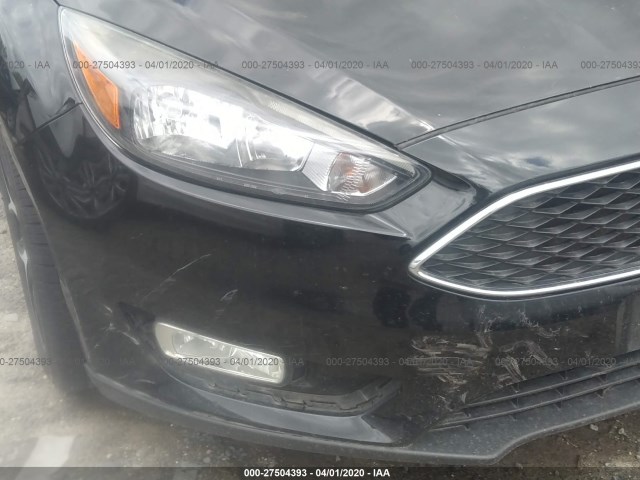 Photo 5 VIN: 1FADP3H27HL214147 - FORD FOCUS 